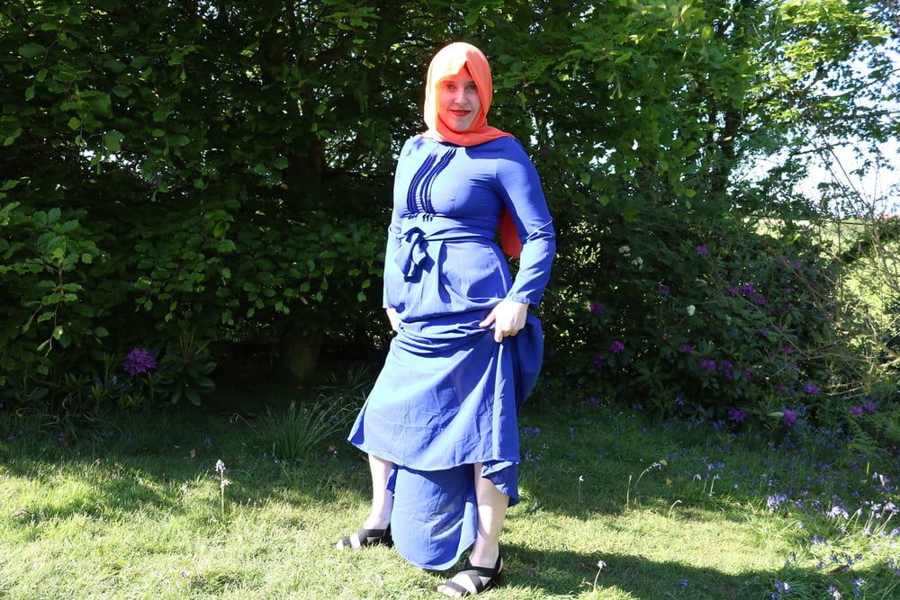 hijab and abaya flashing outdoors #55