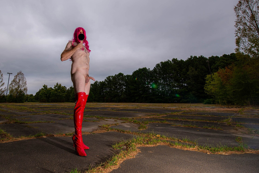 Nude in thigh high boots in public parking lot #7