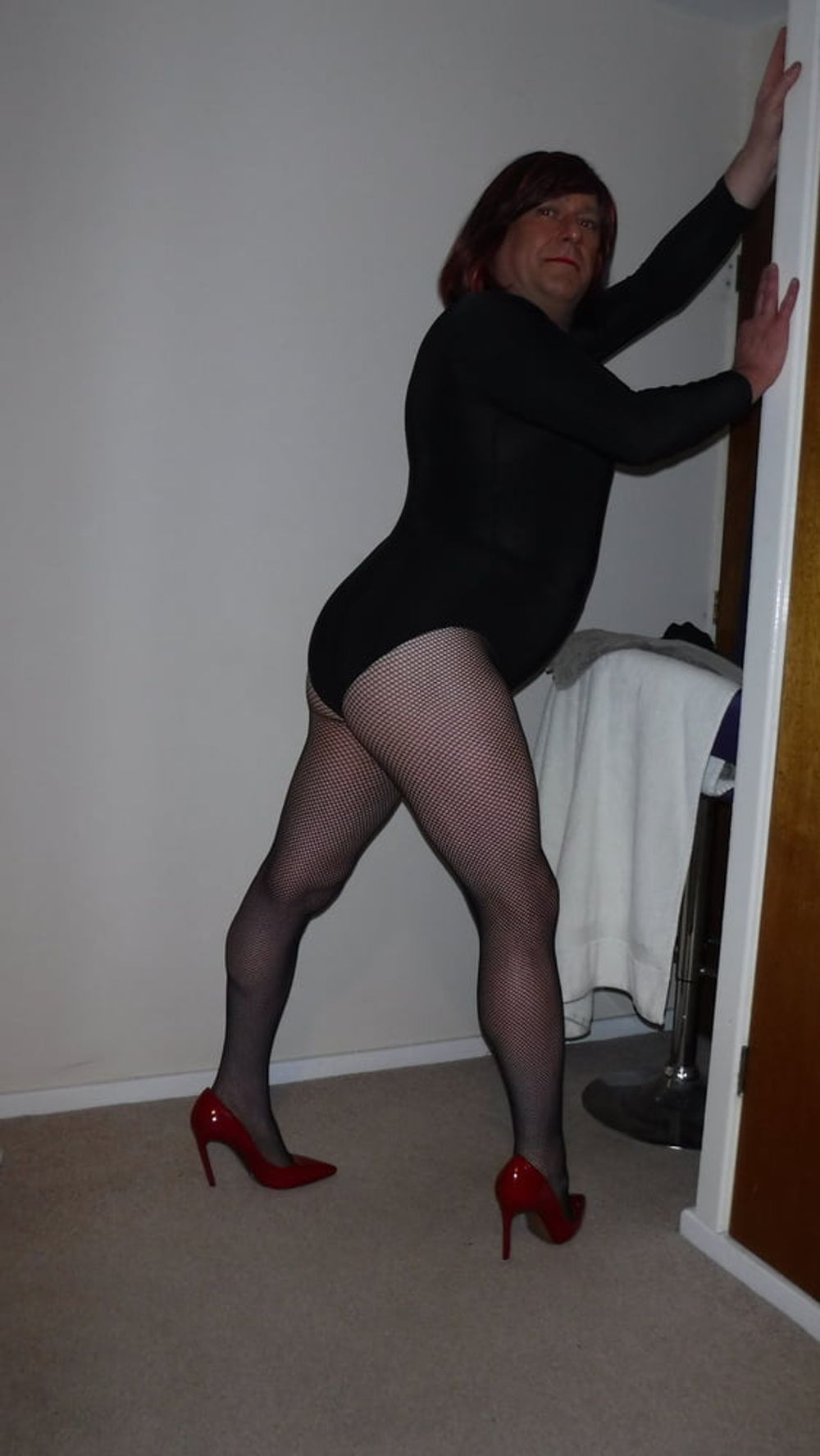 SISSY ROSIE IN FISHNET, RED HEELS AND BODYSUIT #12