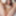 Beautiful blue-eyed Adite exposes her hard nipples