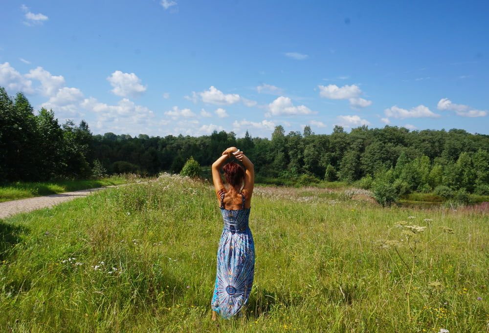 In blue dress in field #23