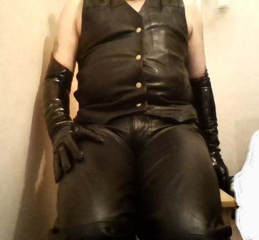 DRESSED IN BLACK TIGHT LEATHER. #48