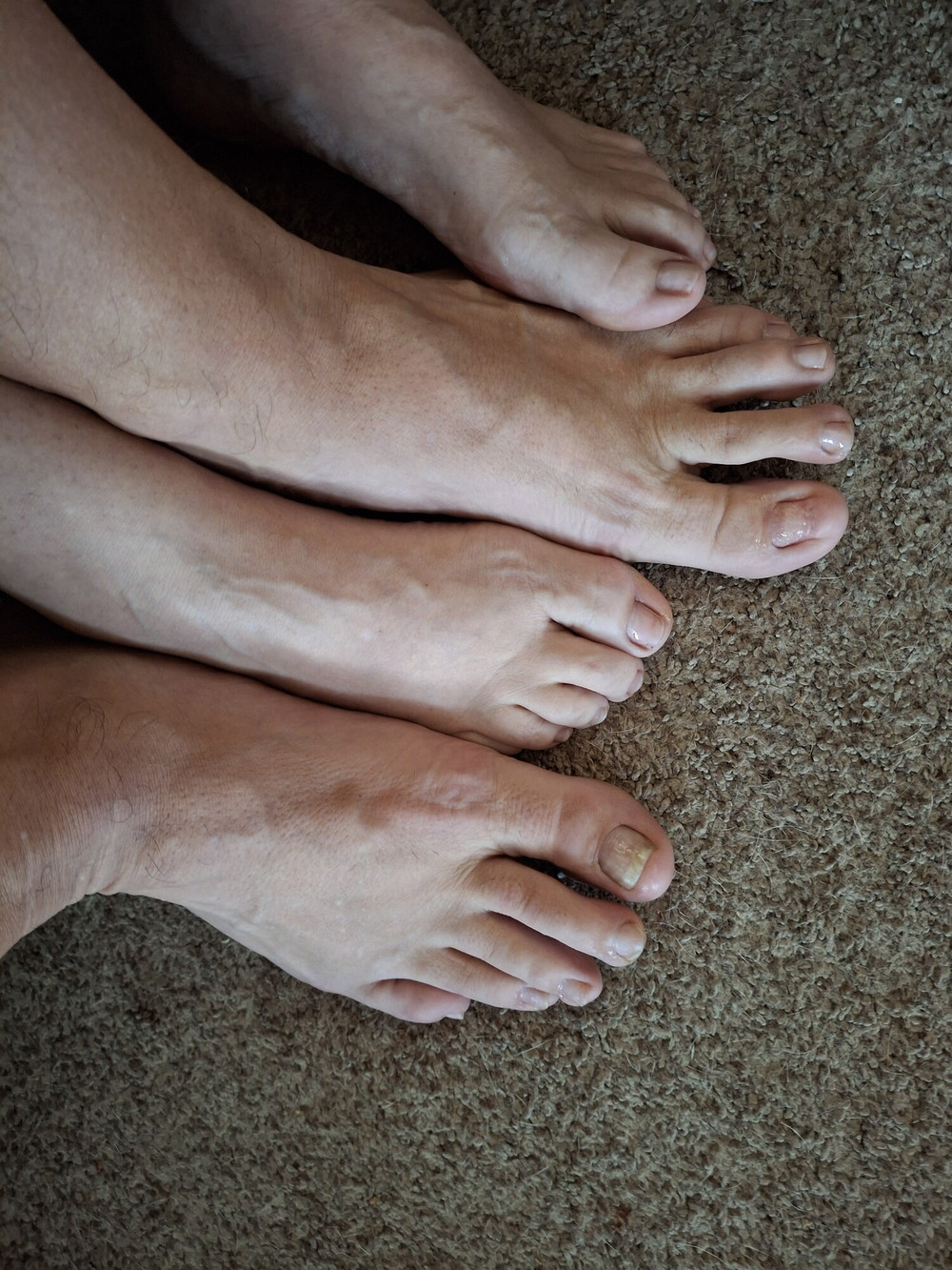 Showing off our un polished toes #2