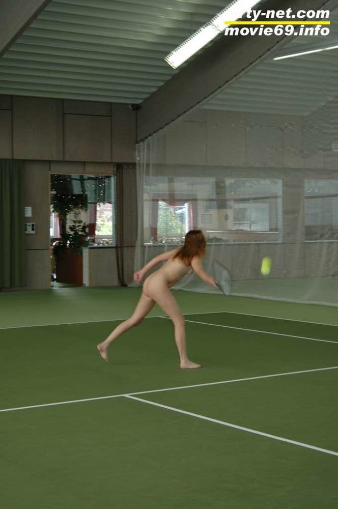 Nathalie plays naked tennis in a tennis hall #14