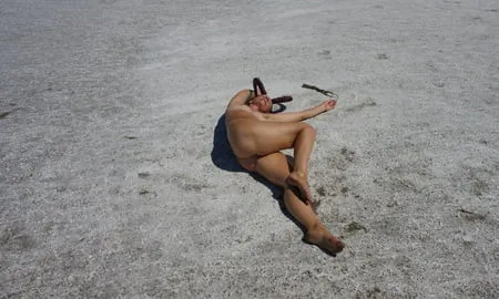 lying naked on the salt of the saltlake elton russia         