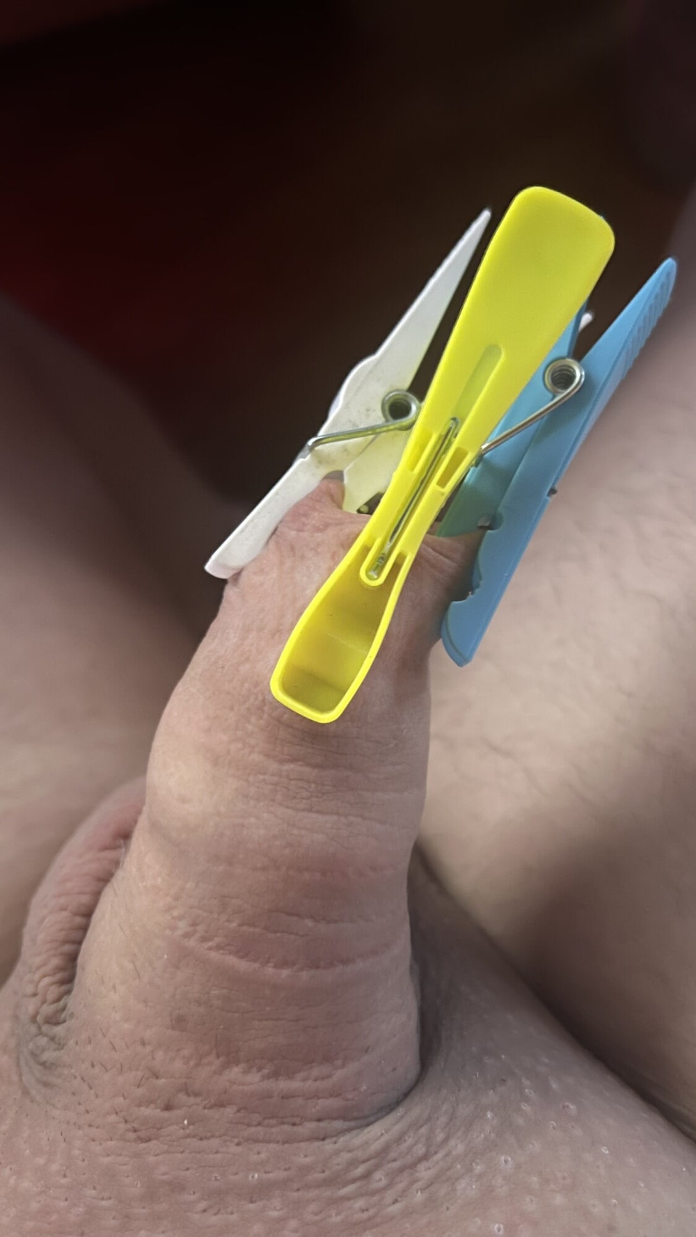 clothespin clamped to the foreskin #6