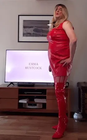 sissy in red lingerie and thigh boots         