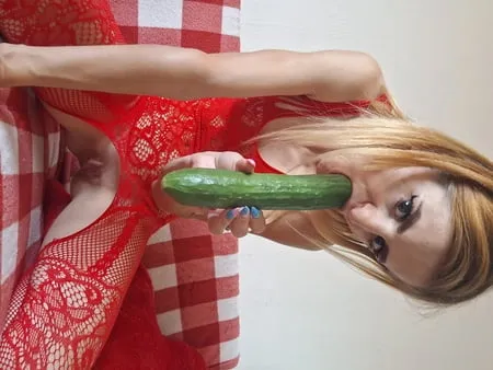 playing with cucumber         