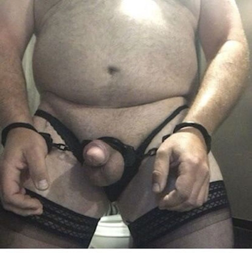 Brandon Hegsted wearing thigh highs, panties and handcuffs #3