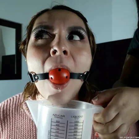 beautiful bitch ball gagged and drooling         