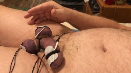 Cock twitches with estim pulse and precum flows as I slap an