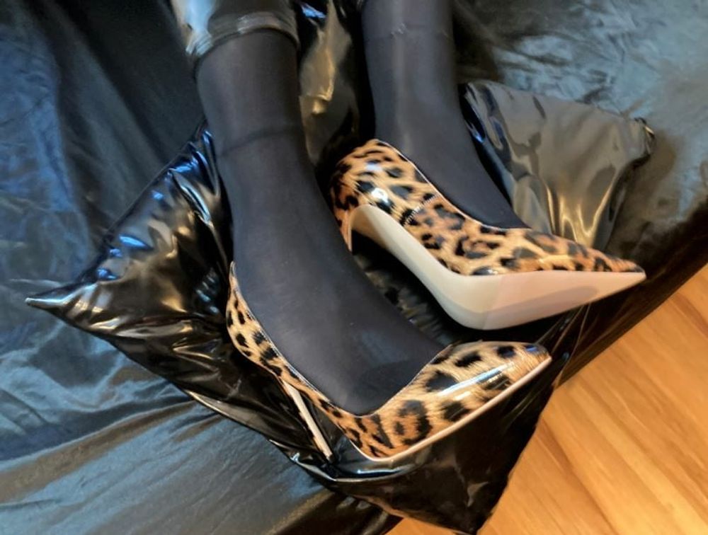 Black Leggings and Animal Print High Heels #7