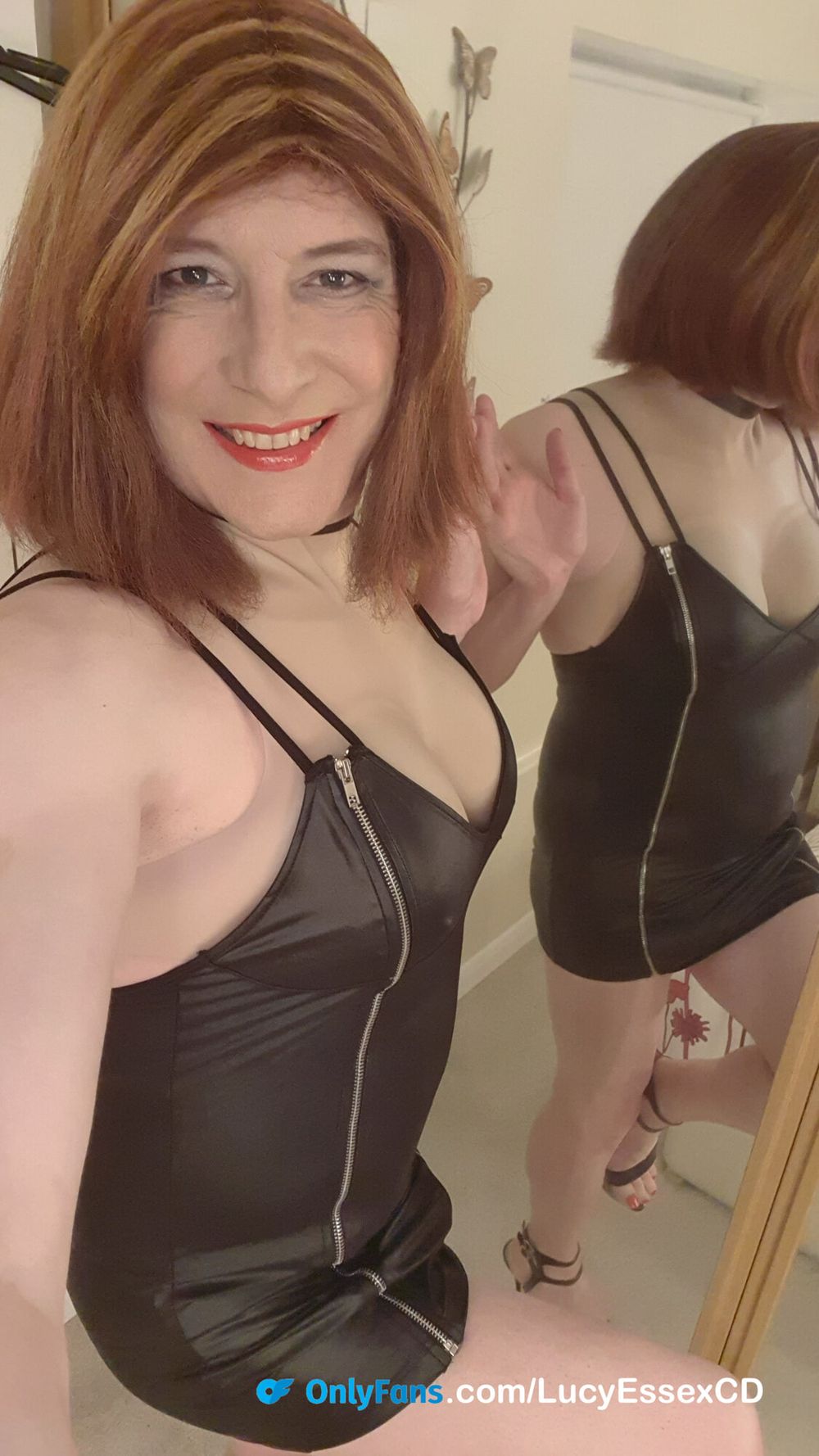 Flashing my black panties in my new black leather look dress