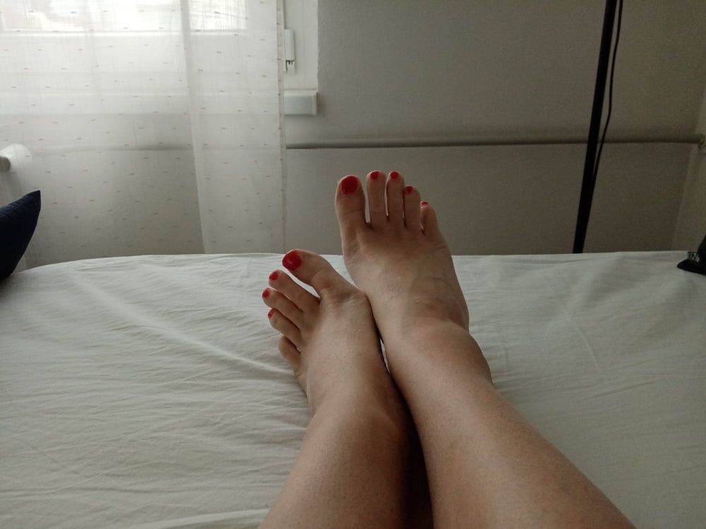 bare smooth slender legs with red painted toes #3