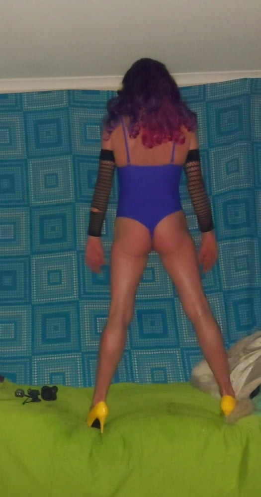Purple swimsuit and wand album #43