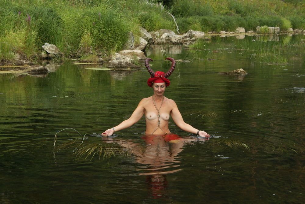 With Horns In Red Dress In Shallow River #53