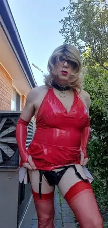 rachel wears red pvc dress         