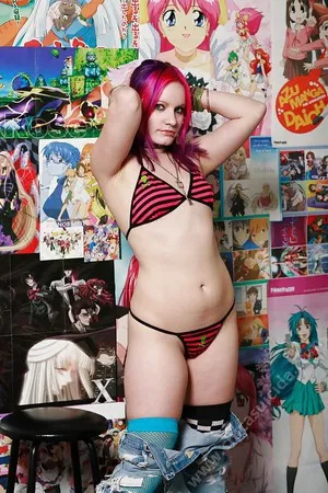 anime junkie girl doing strip tease        