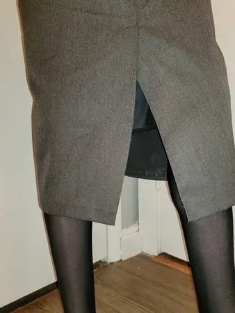 grey pencil skirt with black silky half slip         