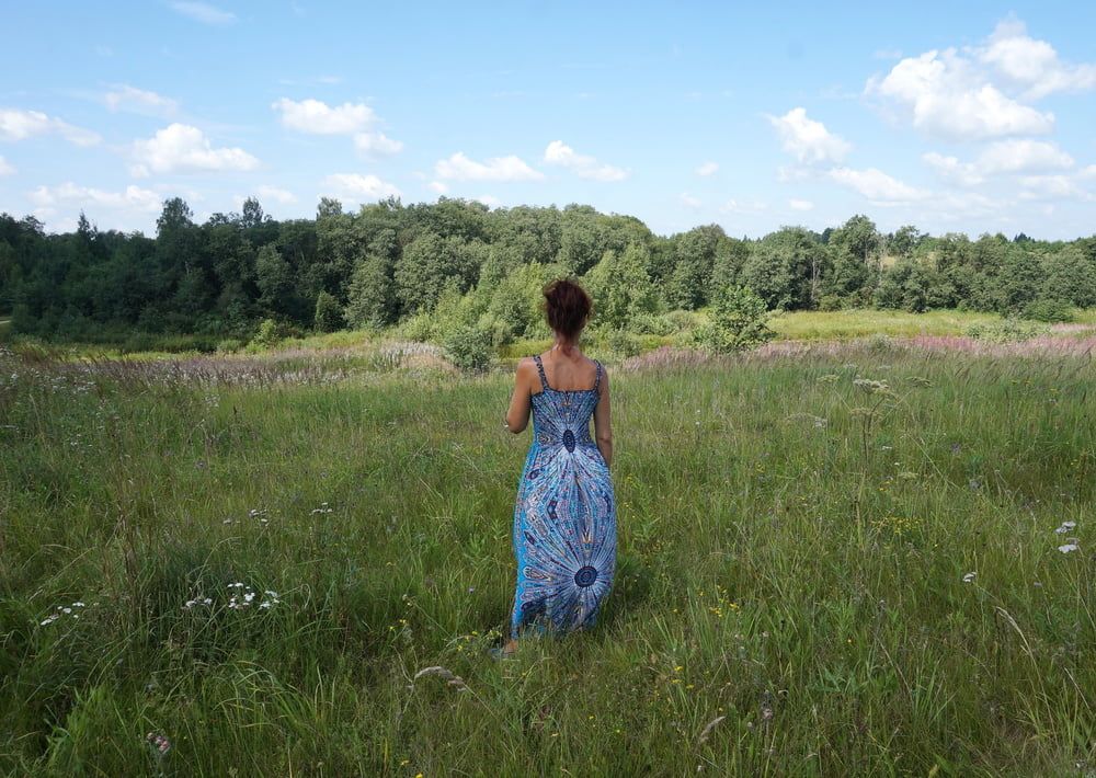 In blue dress in field #28