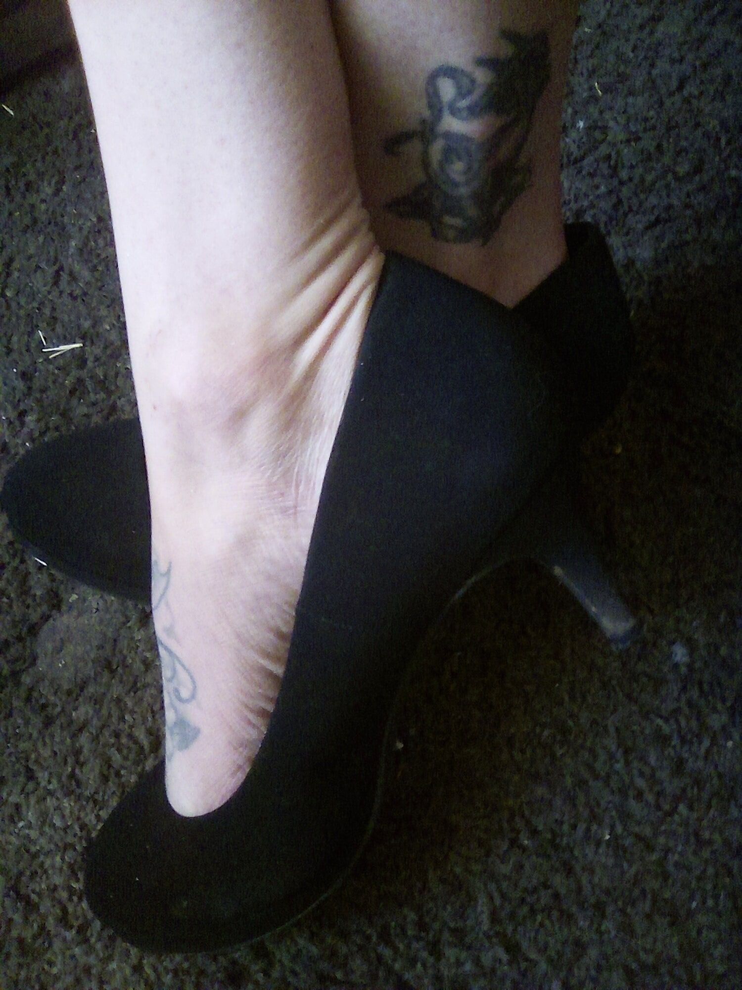 Tatted feet in heels