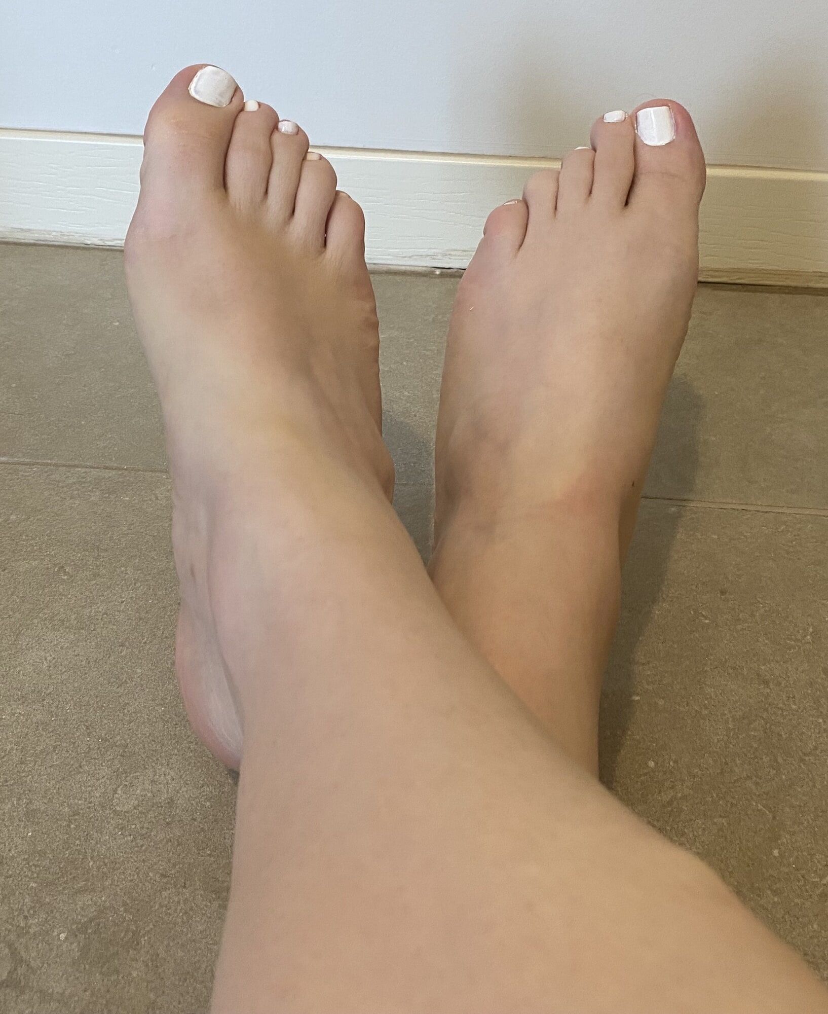 White polished nails and shaved legs #17