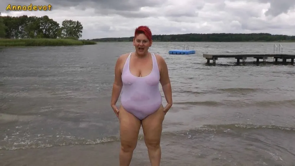 In WHITE SWIMSUIT in the lake