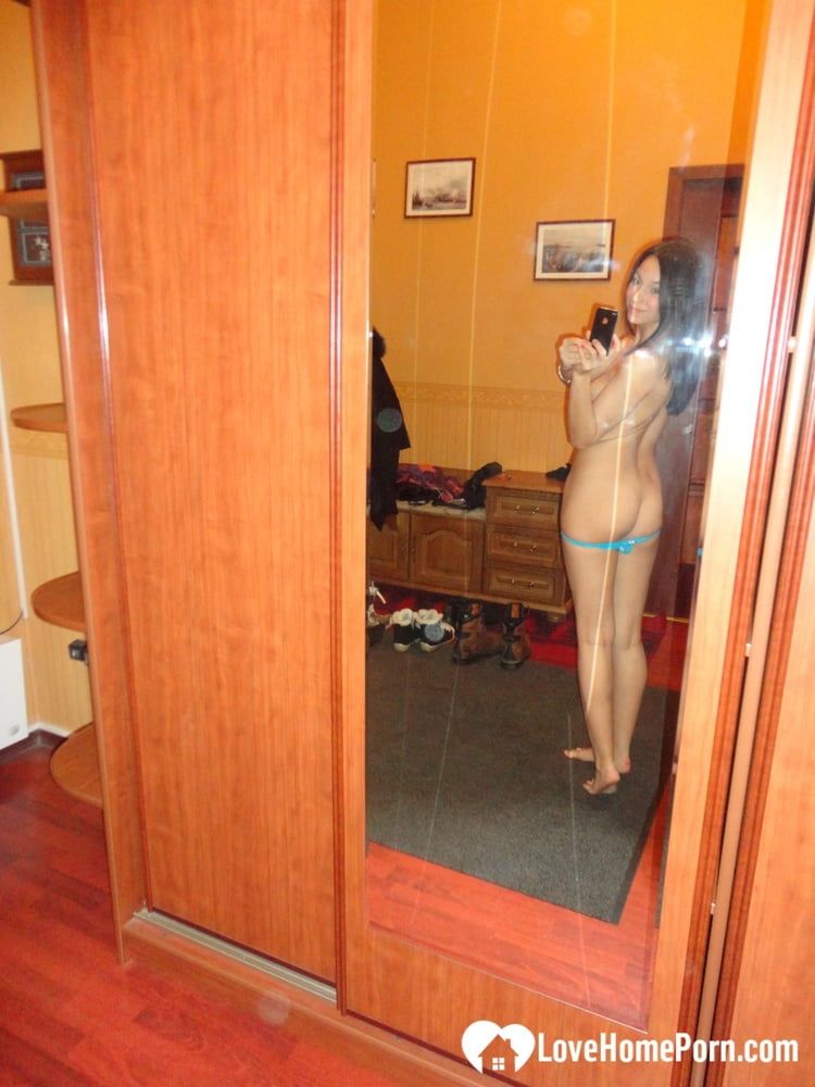 Hot teen shows her body in the mirror #13