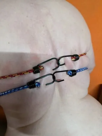 tits bound with rubber rope         