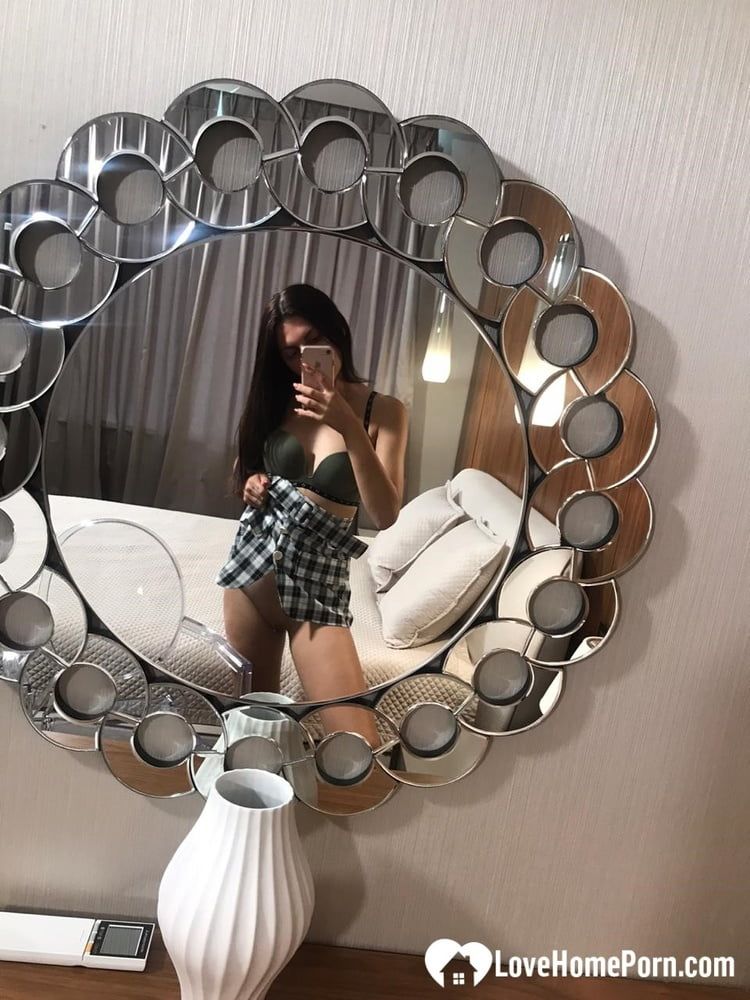 Hot schoolgirl reveals her tits in the mirror #7