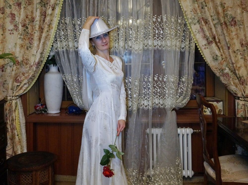 In Wedding Dress and White Hat #32