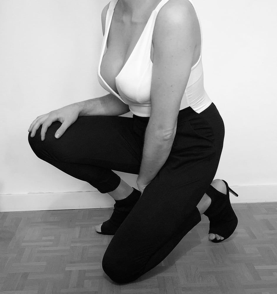 Black & white jumpsuit huge cleavage