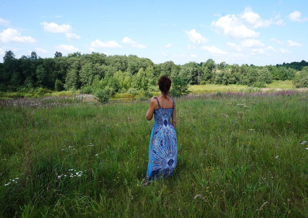 In blue dress in field #29