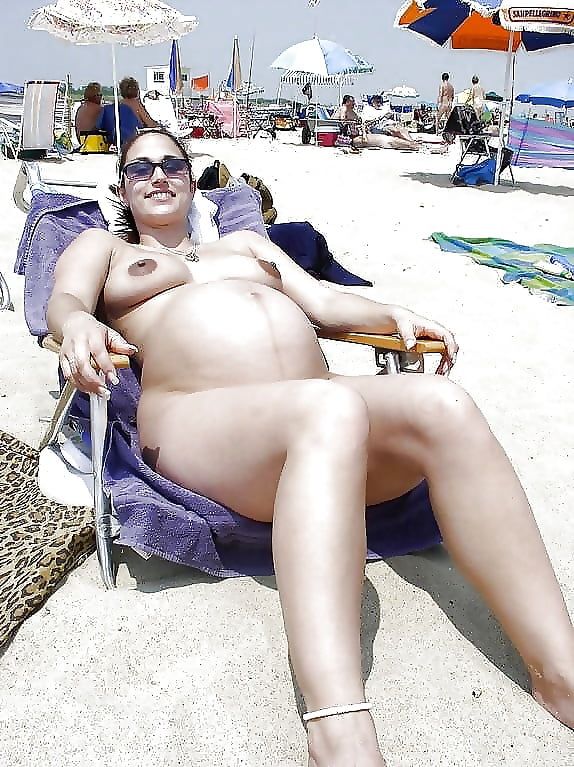 Pregnant Nudist on Beach
