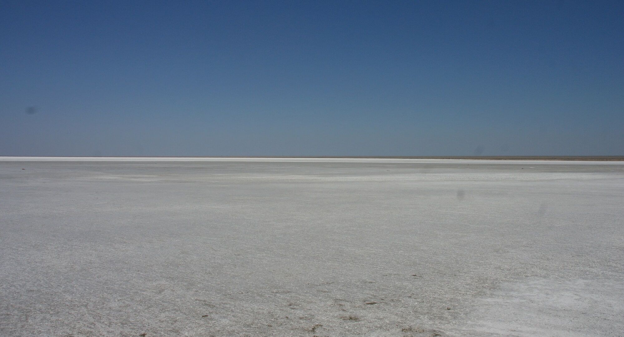 Standing naked on the salt of the salt lake Elton #34