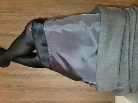 grey pencil skirt with black silky half slip         