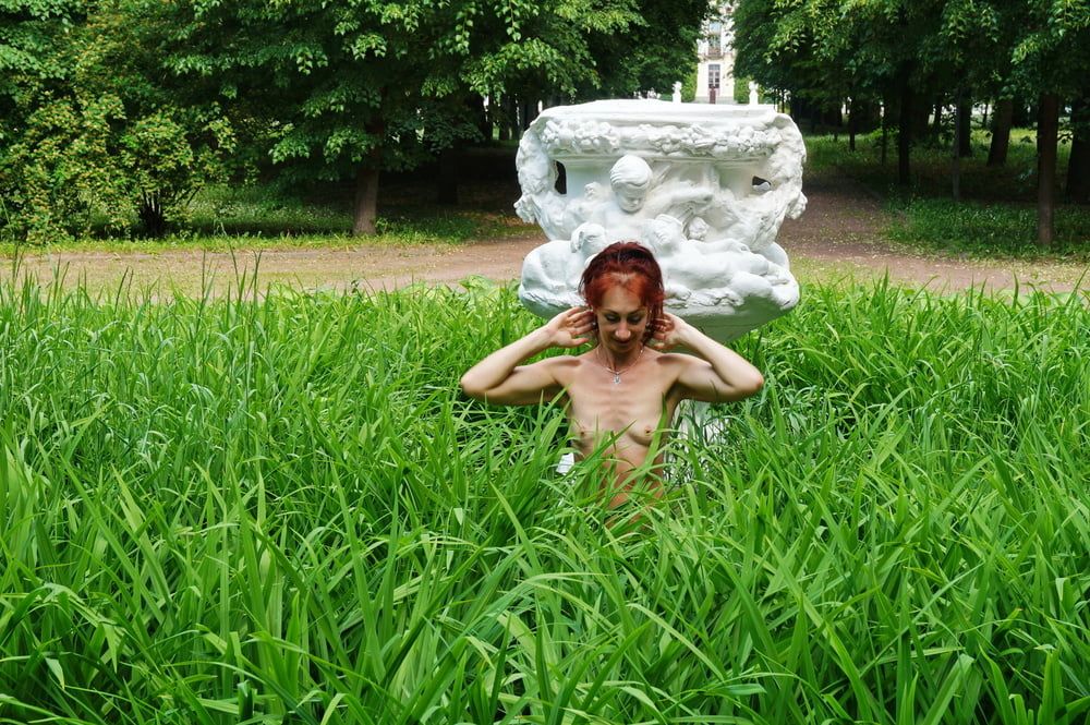Naked in the grass by the vase #46