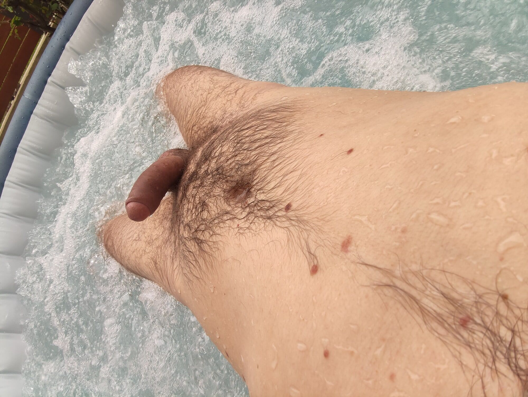 In jacuzzi showing balls and cock #5