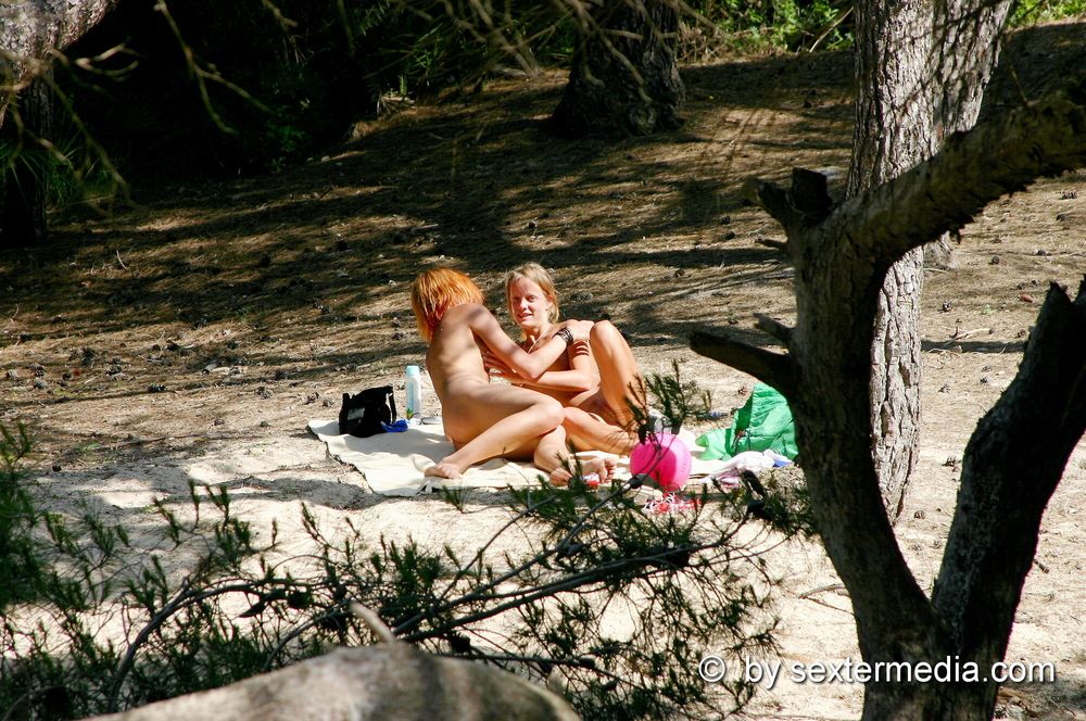 Girls lesbian games on the beach in Mallorca