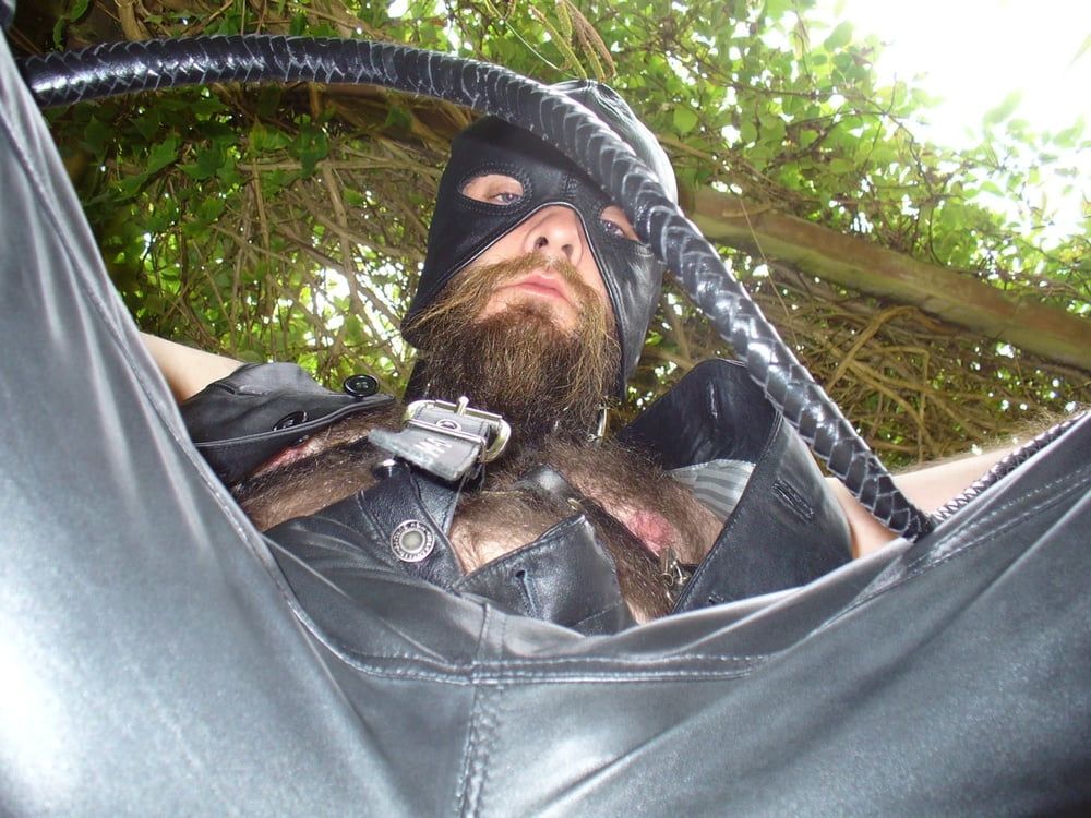 Leather Master outdoors in harness with whip #40