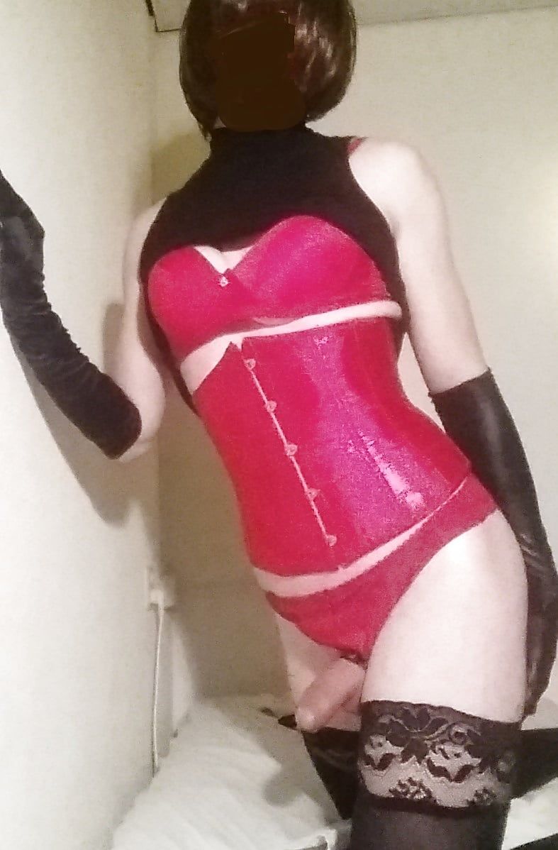Sexy sissy posing in corset
