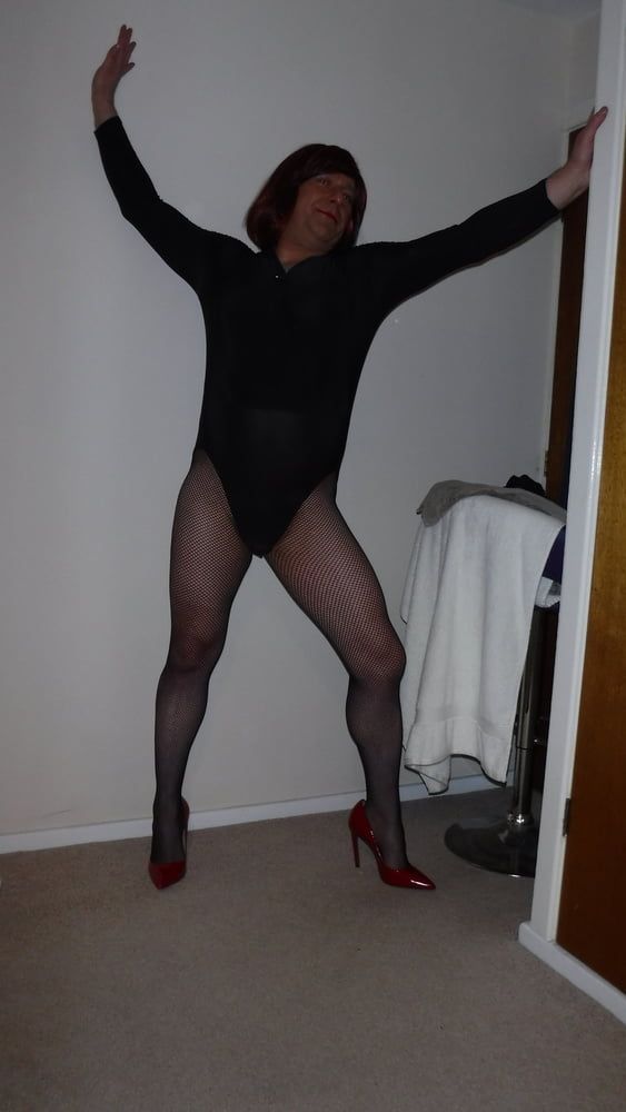 SISSY ROSIE IN FISHNET, RED HEELS AND BODYSUIT #18