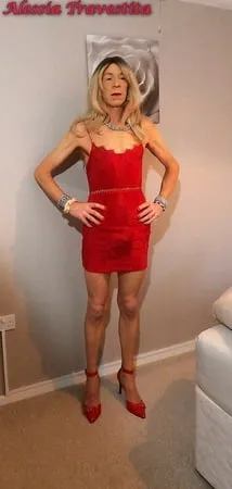    alessia travestita in red velvet dress         