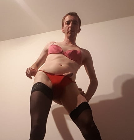Lars Damberger with boner in red Satin panty