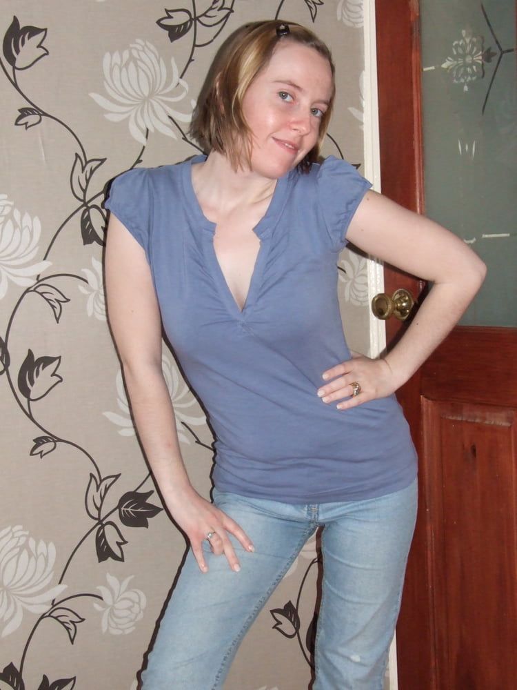 cute blonde posing in jeans and shirt  #3