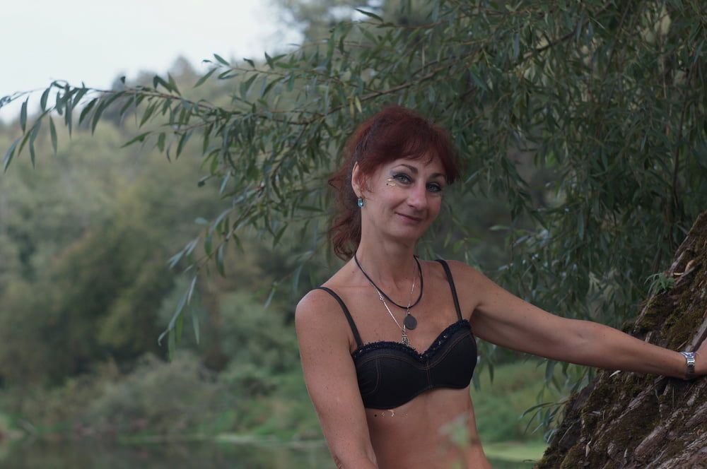Black bikini near tree upon river #19