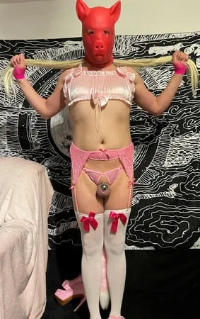 sissy wearing ultra tiny cock cage and lingerie         