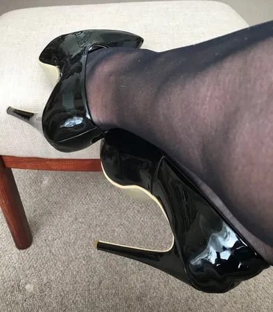 black tights heels close up         