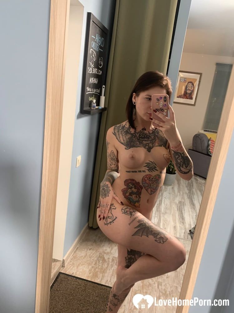 Tattooed babe taking selfies with amazing angles #12