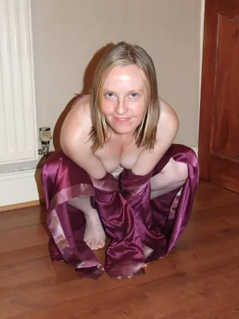 young wife posing in silk nighty         